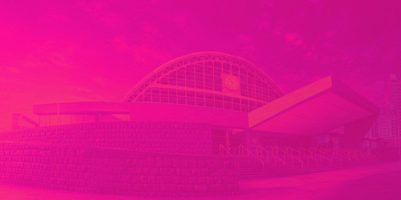 Manchester Central building in ATOMICON’s promotional imagery; the event venue is not yet confirmed.